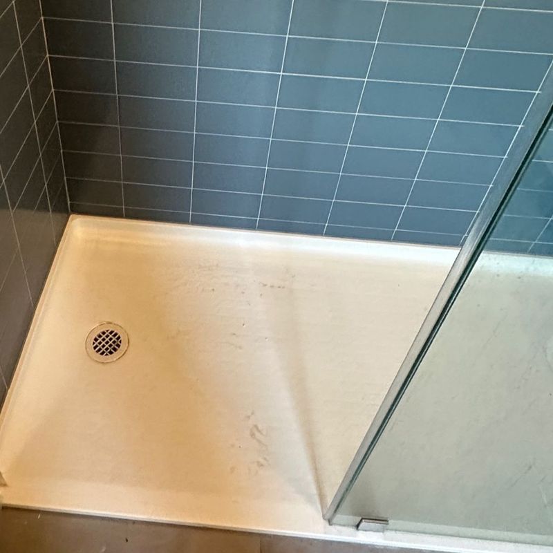 Walk-in shower before cleaning